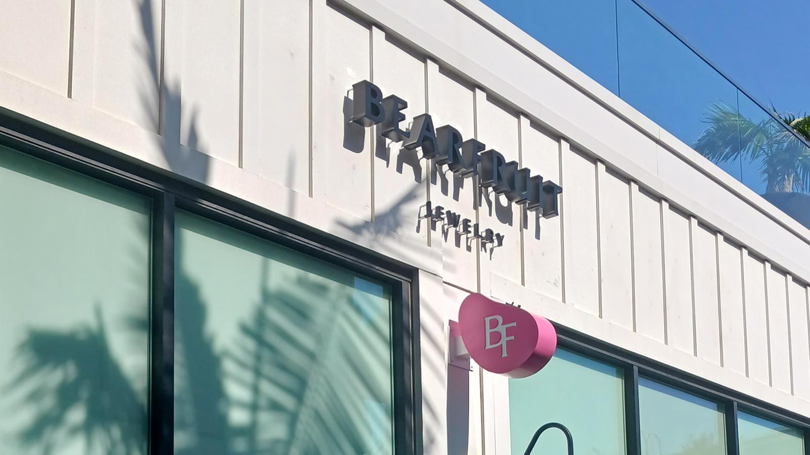 Bearfruit Jewelry outdoor sign installed on the facade