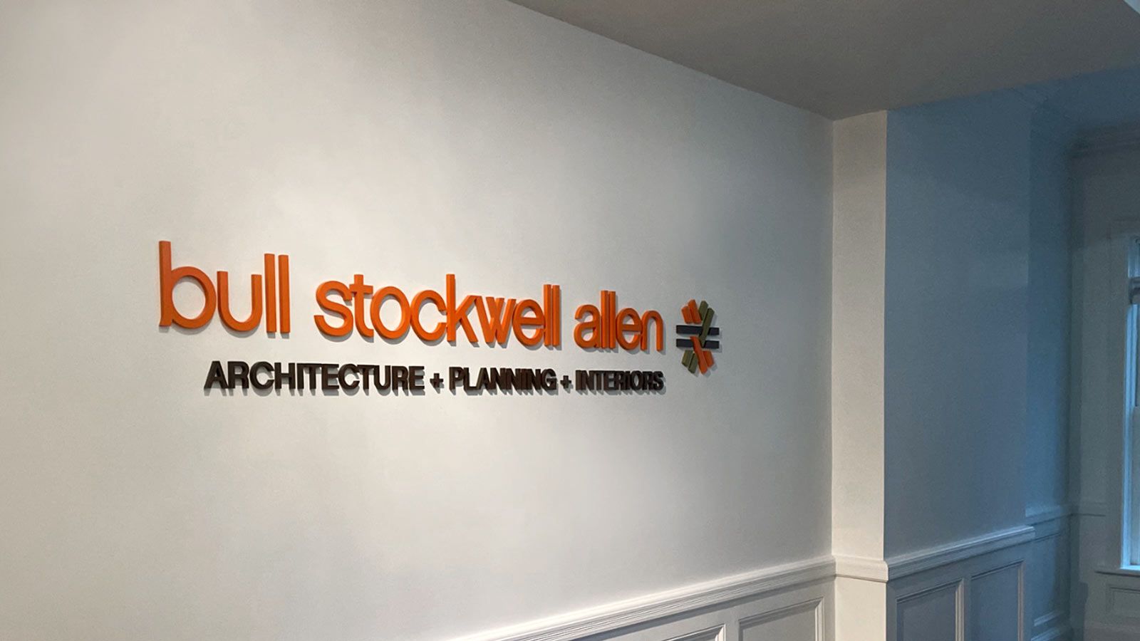 Bull Stockwell Allen lobby sign mounted on the wall