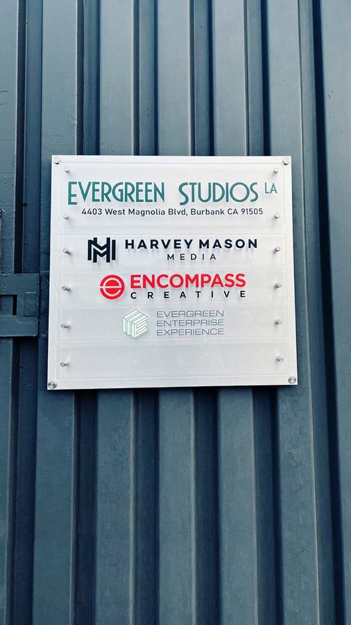 Evergreen Studios LA outdoor sign mounted on the wall