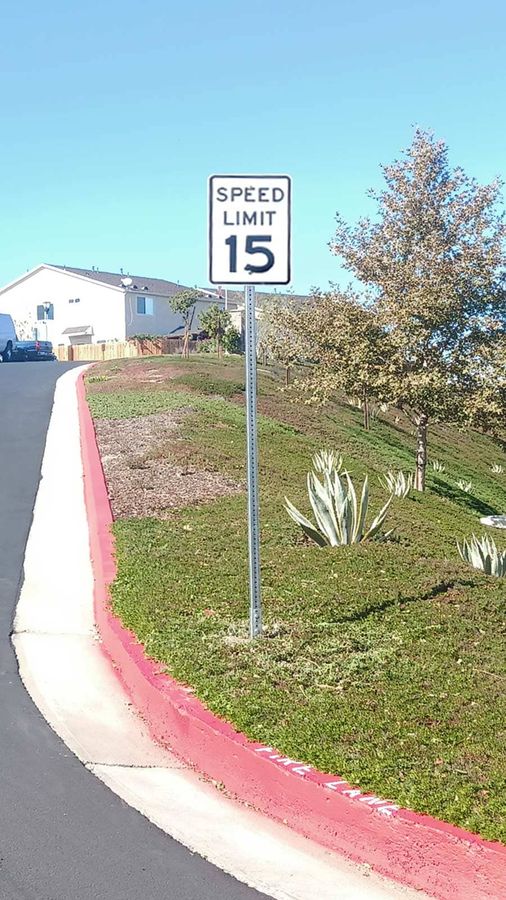 Installation of a regulatory sign on the roadway