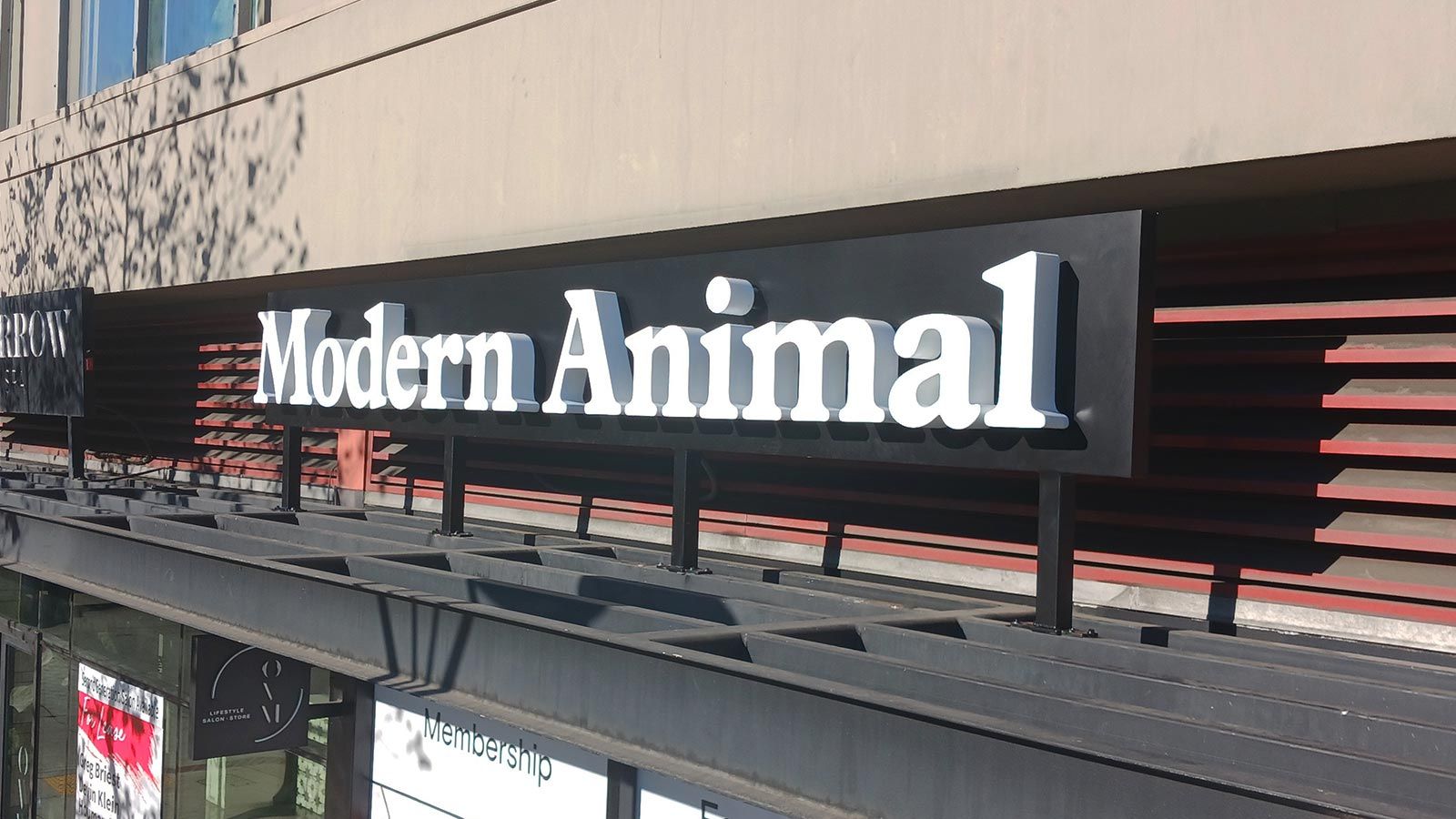 Modern Animal building sign decorating the facade