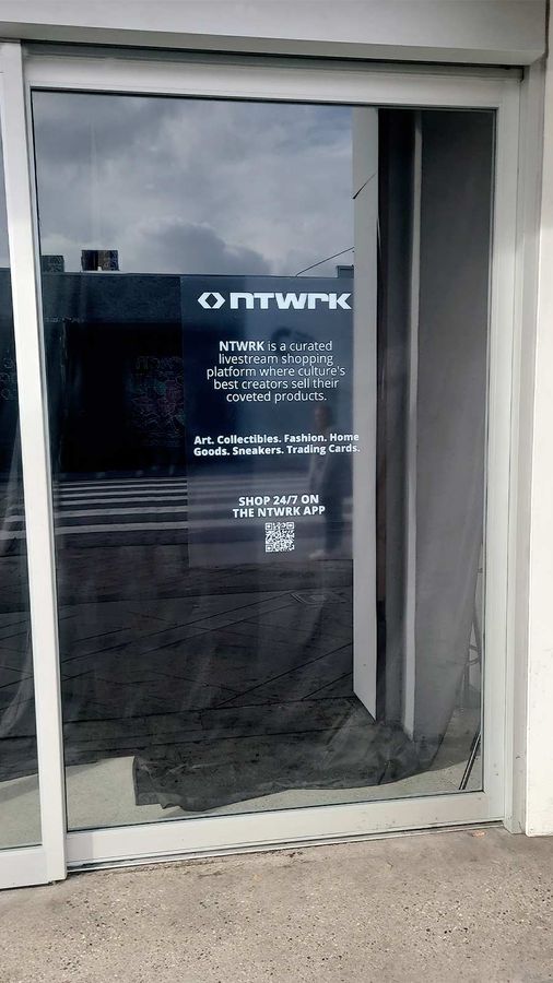 NTWRK store sign applied to the window glass