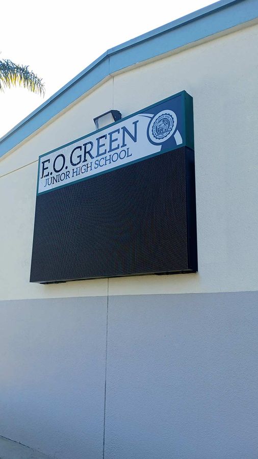Outdoor sign installation on the exterior wall
