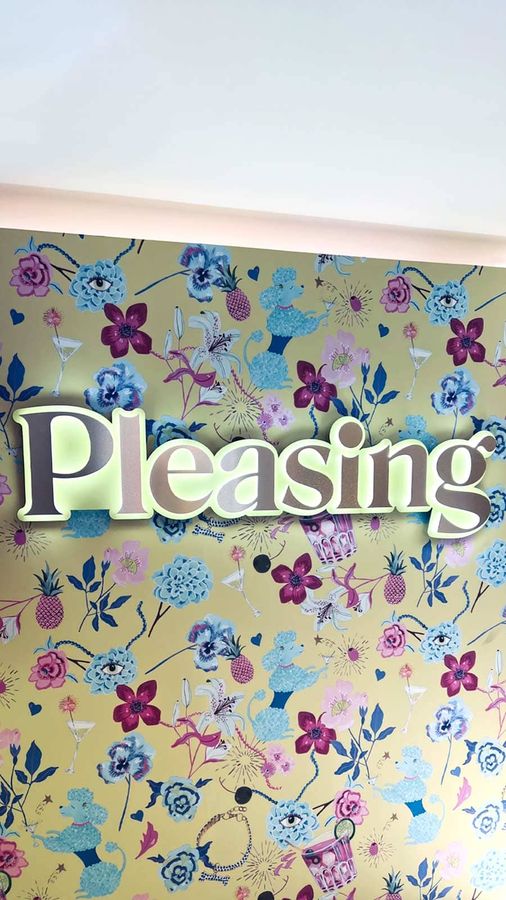 Pleasing logo sign attached to the wall