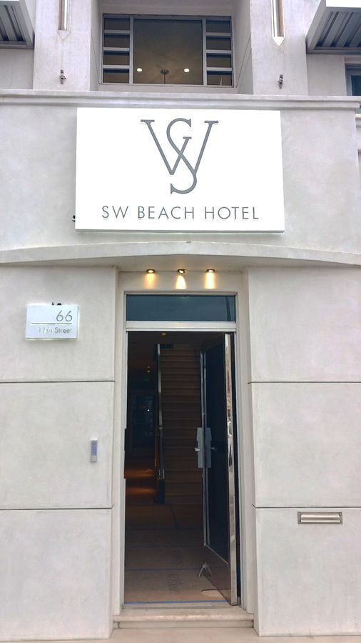 SW Beach Hotel outdoor sign mounted on the facade