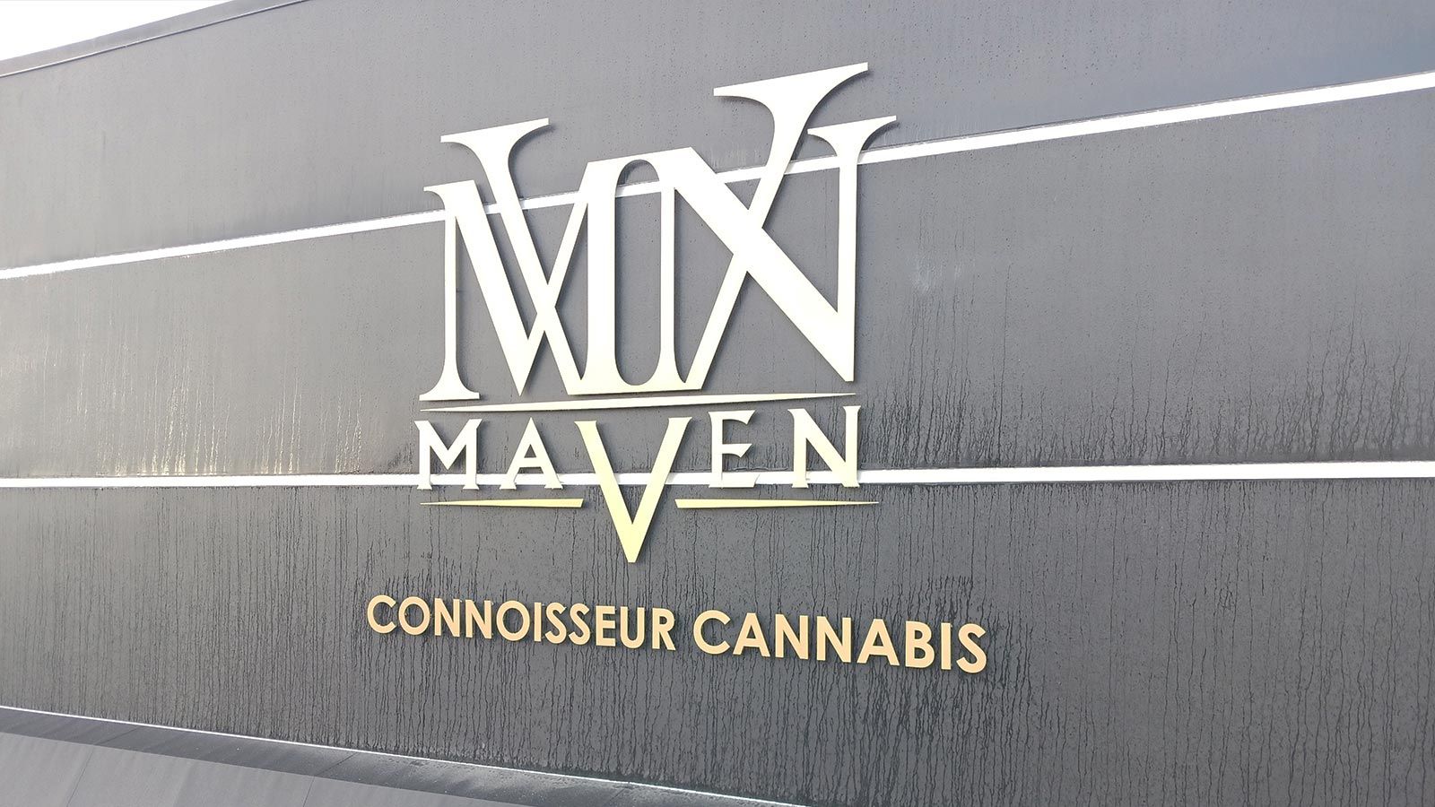 The Maven Store logo sign fixed to the exterior wall