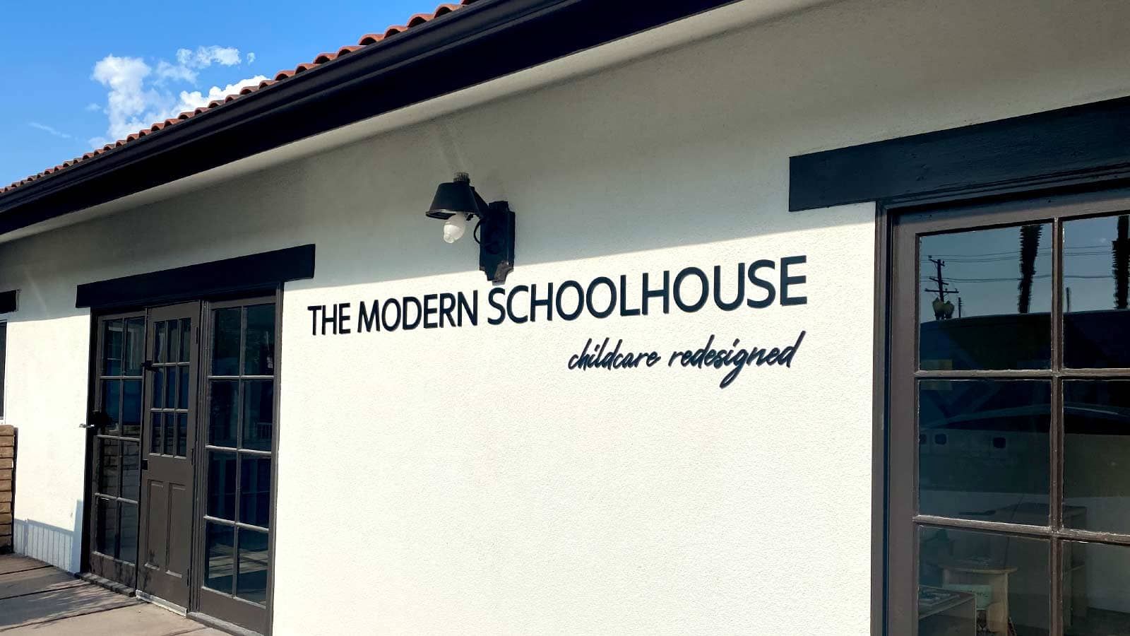 The Modern Schoolhouse 3D sign attached to the wall