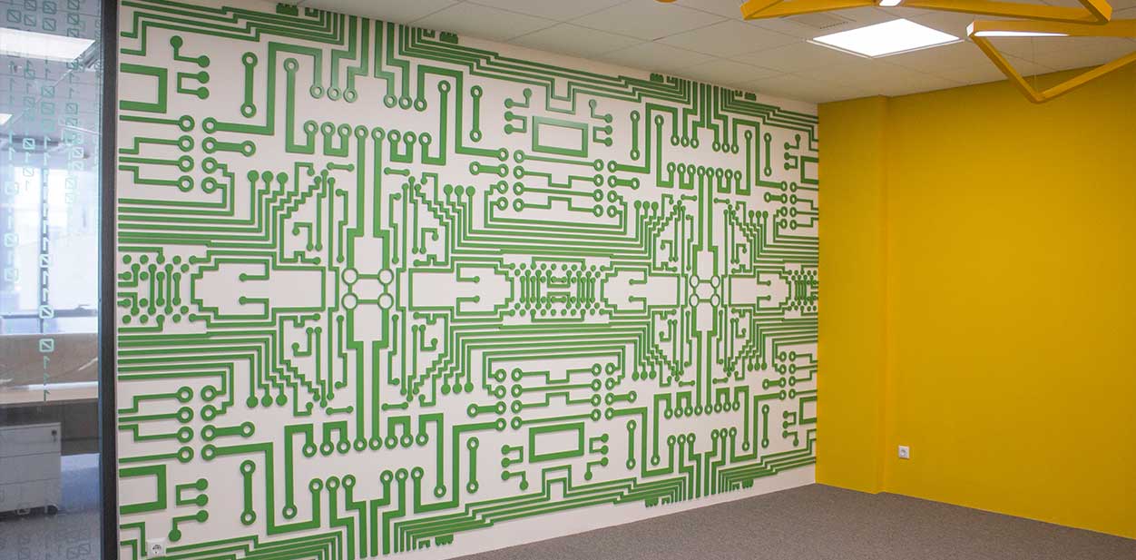 Decorative feature wall design consisting of green chip-scheme lines on a white background