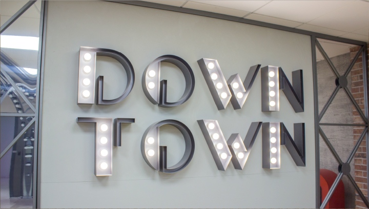 Down Town custom letter signage with little LED bulbs made of aluminum for interior branding
