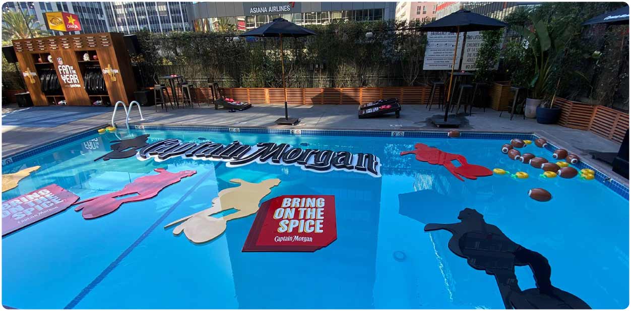 Engine Shop Agency corporate branding design with floating foam decors for the pool