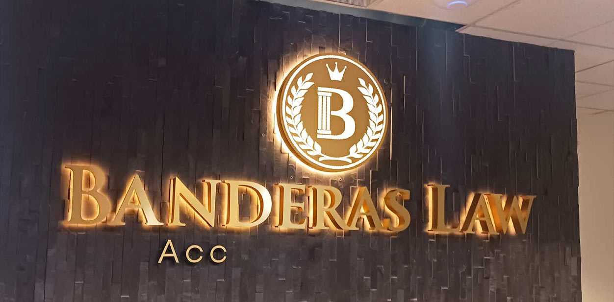 Banderas Law feature wall design in a light-up style displaying the brand name and logo