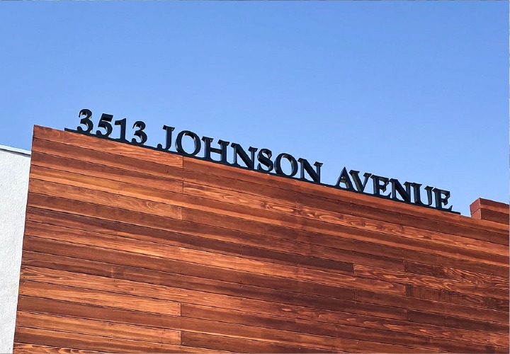 Johnson Avenue architectural signage with black address letters made of acrylic for branding