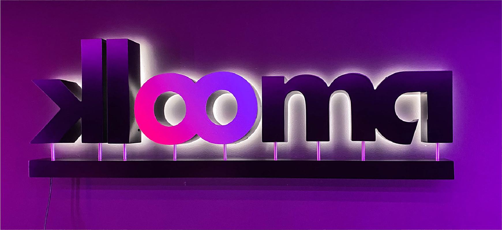 Klooma business letter sign in purple hues with back illumination made of aluminum and lexan