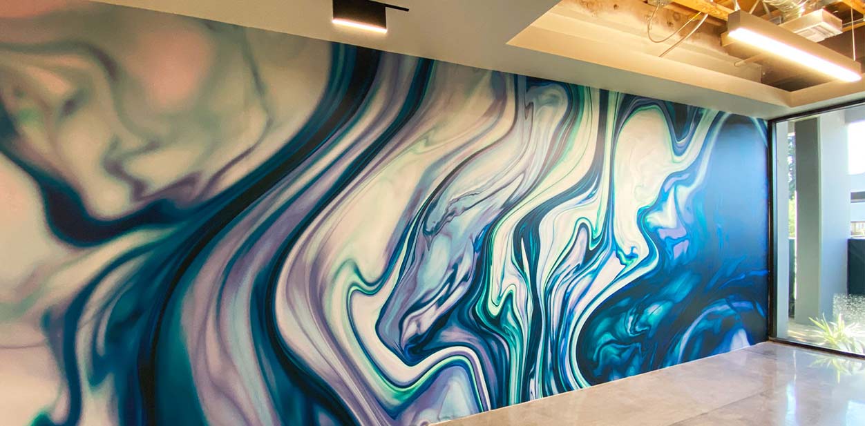 Colorful feature wall design with a molding texture in blue and purple hues