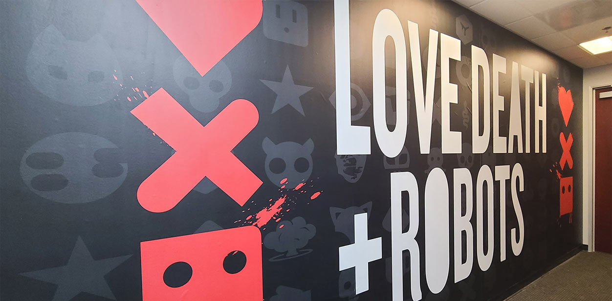 LOVE DEATH + ROBOTS feature wall design with a black wallpaper displaying different characters