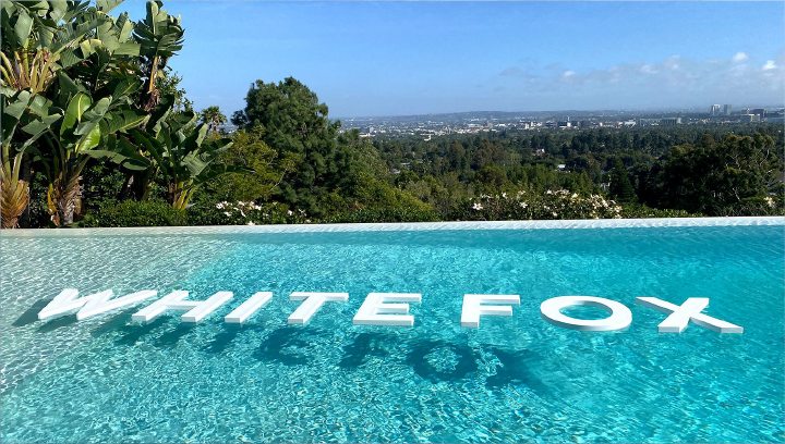White Fox letter signage in a floating style made of acrylic and foam board for pool branding