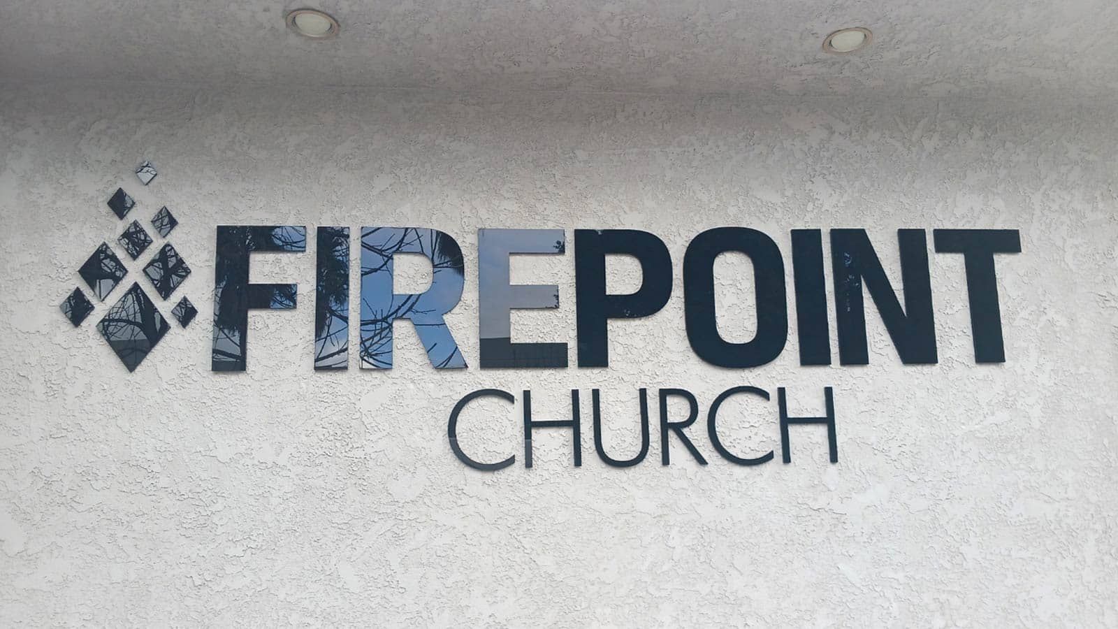 Firepoint Church outdoor sign mounted on the exterior wall