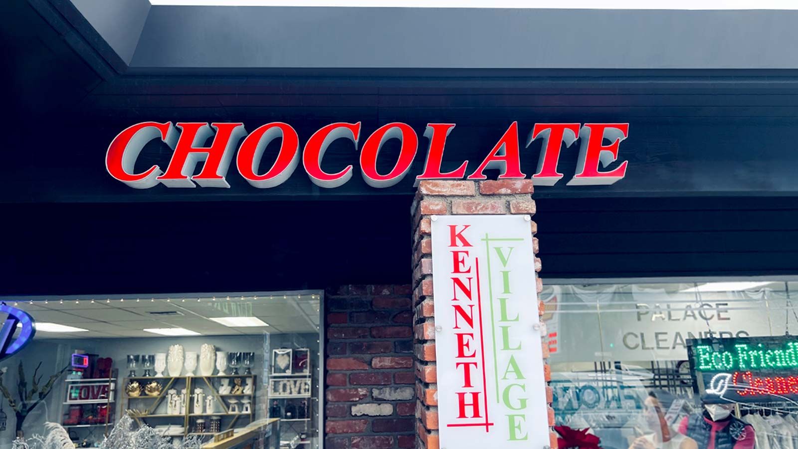 Kenneth Village store sign installed outdoors