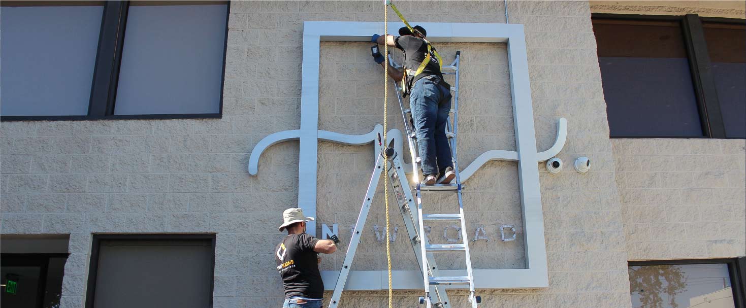 New Road sign replacement of an outdoor business display made of aluminum for branding