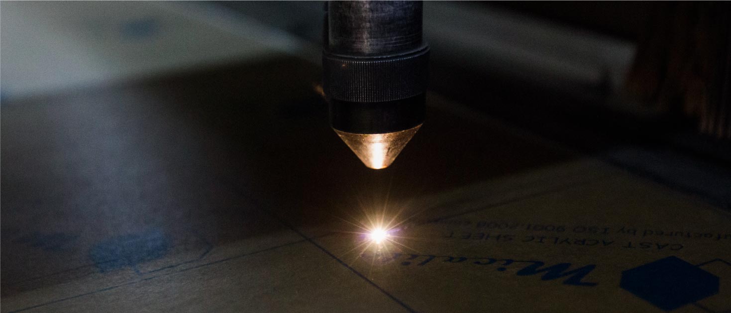 Laser engraving process on a sheet of acrylic with a highly precise technique