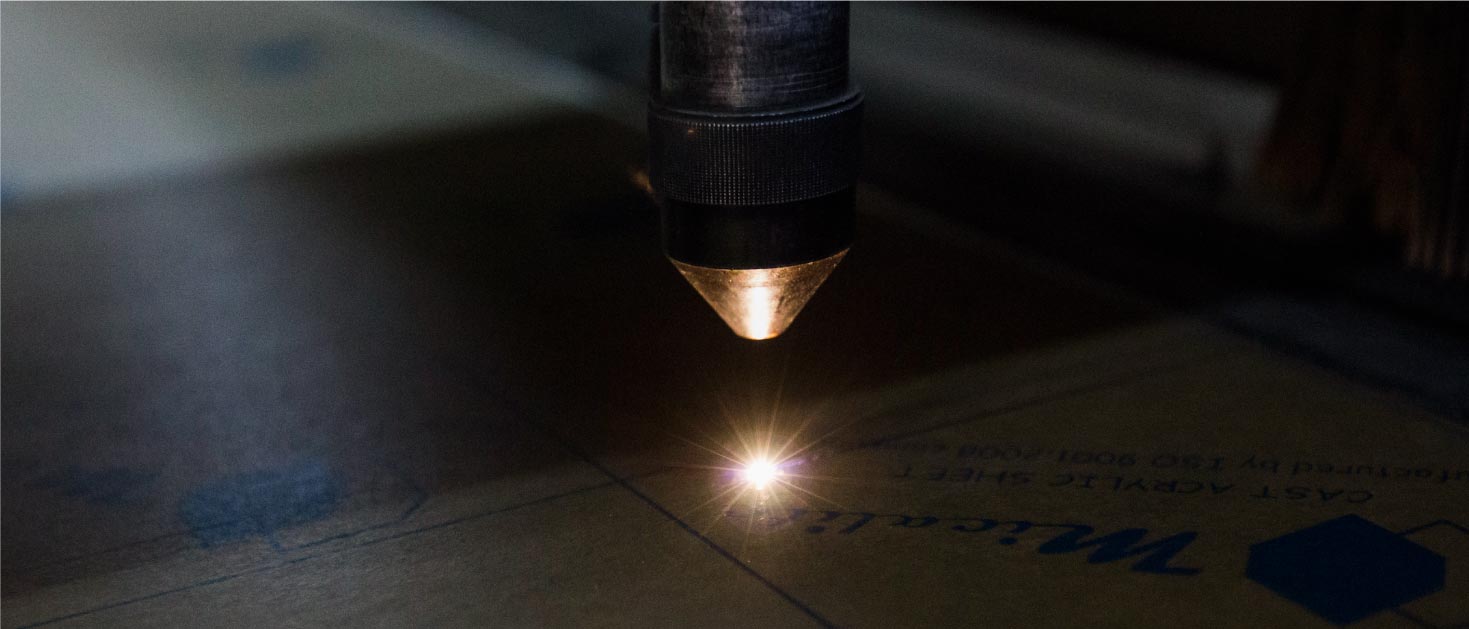 Laser engraving process on a sheet of acrylic with a highly precise technique