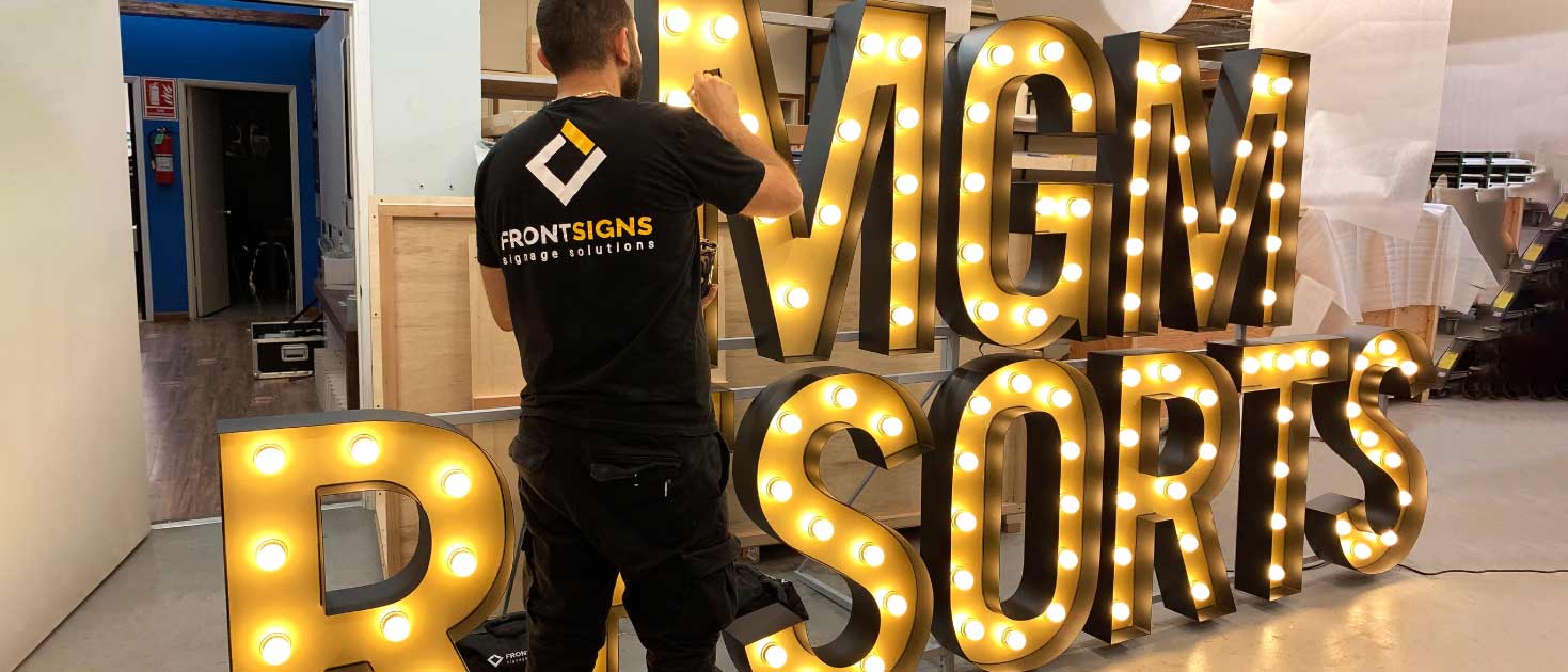 MGM Resorts sign making process with large illuminated letters using aluminum