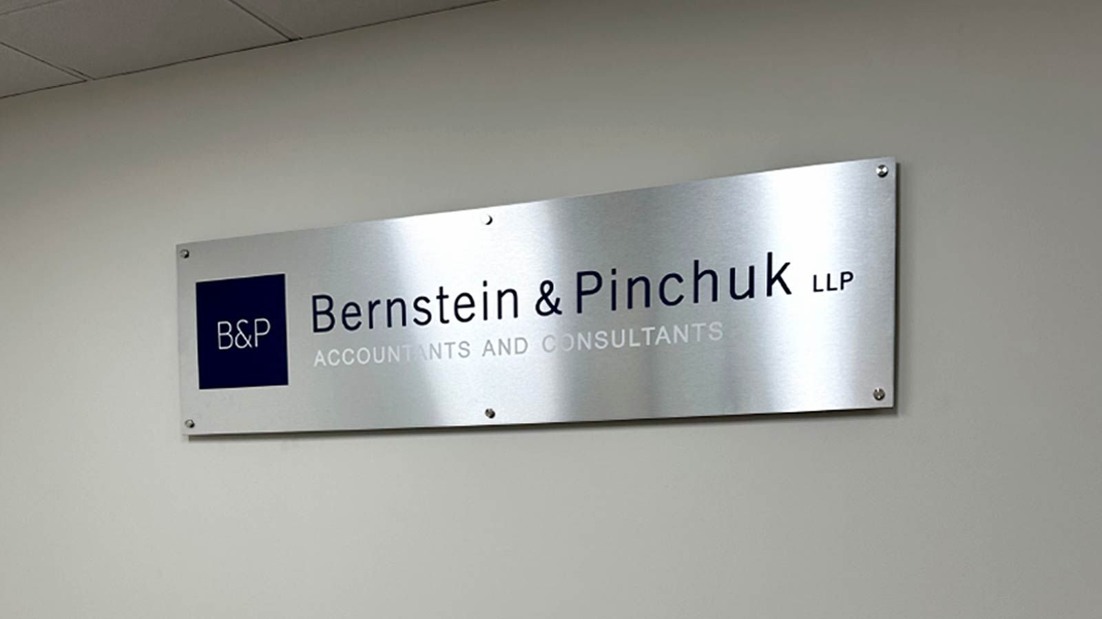 Bernstein and Pinchuk LLP interior sign placed on the wall