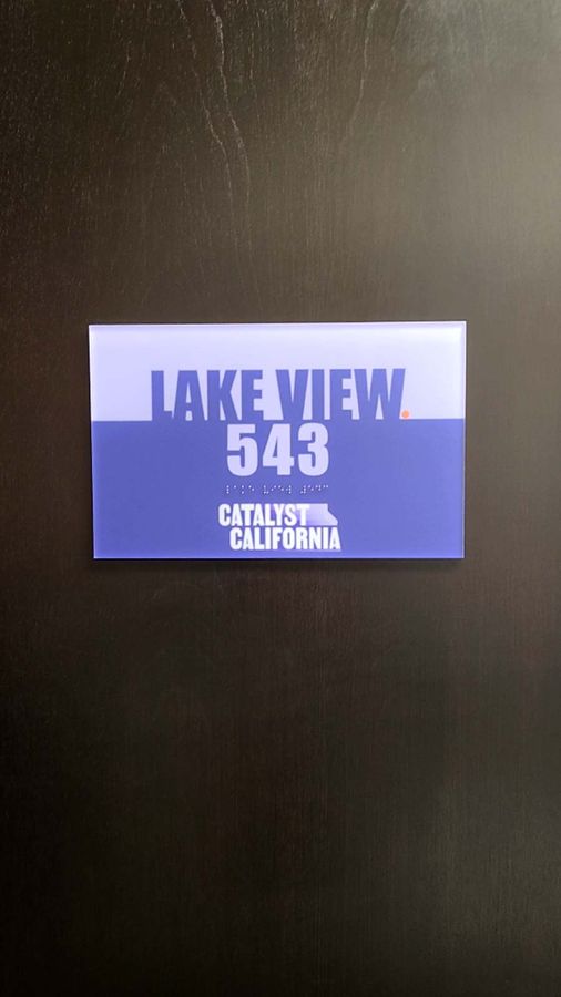Catalyst California office sign placed on the door