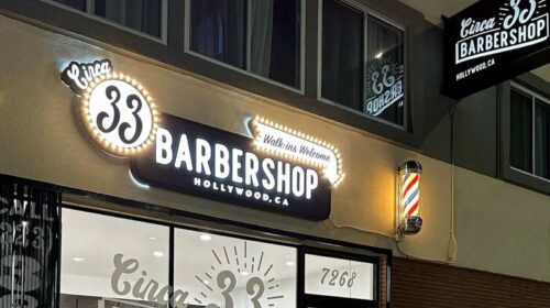 Circa 33 Barbershop light up signs mounted on the building