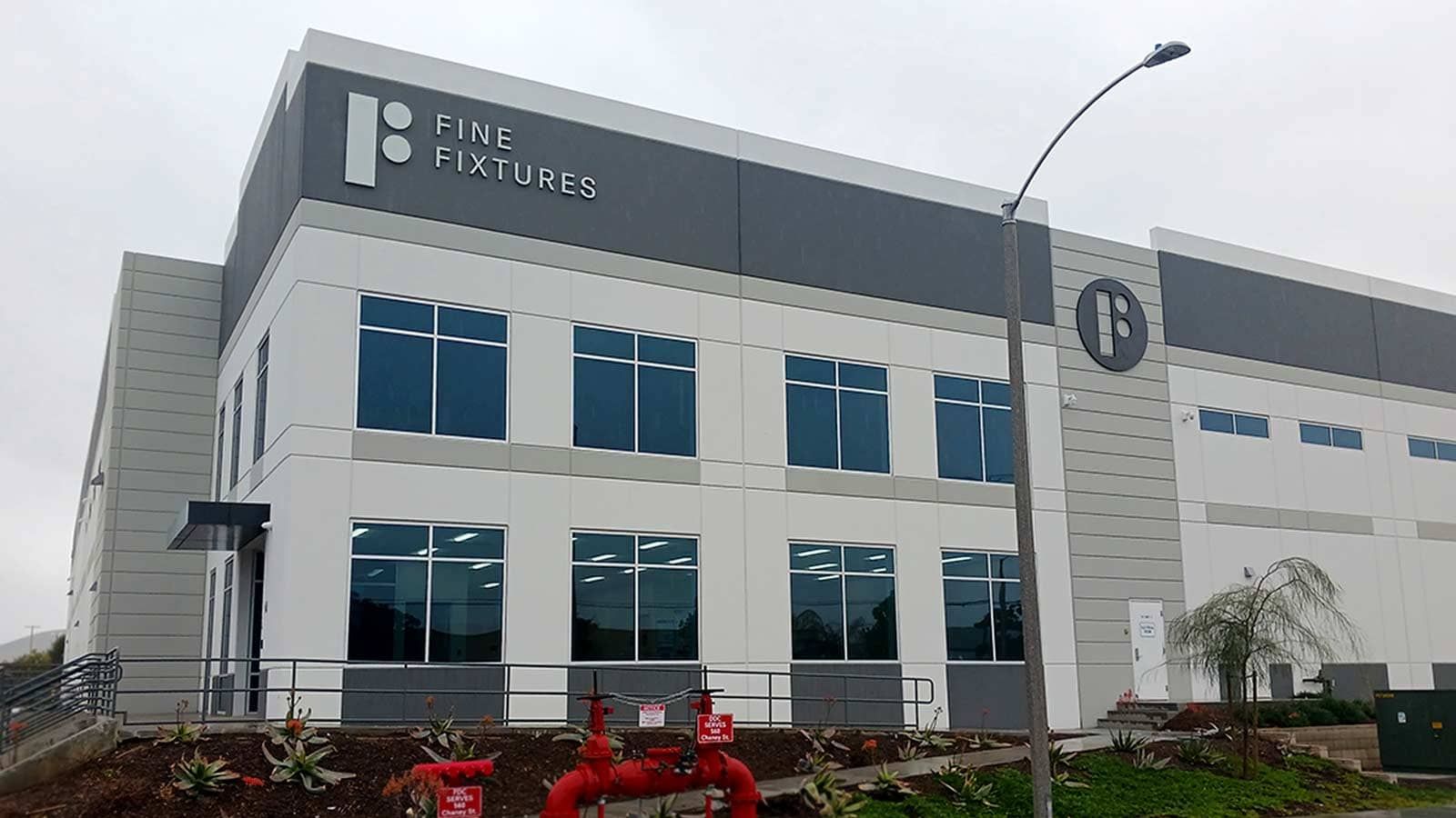 Fine Fixtures outdoor signs installation on the building top
