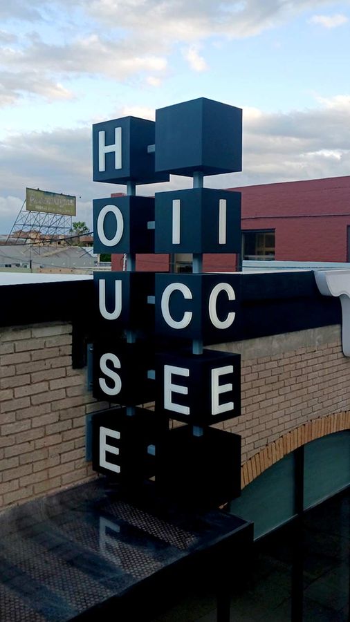 Ice House light box sign fixed to the facade