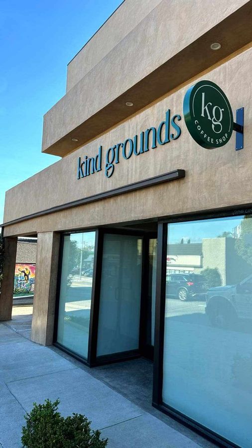 Kind Grounds building signs mounted on the facade