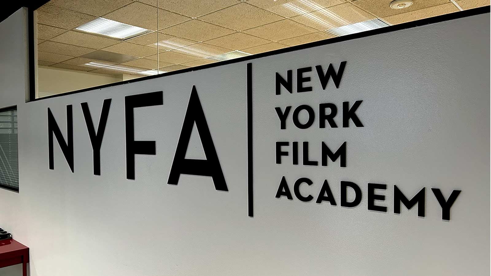 New York Film Academy acrylic sign attached to the wall