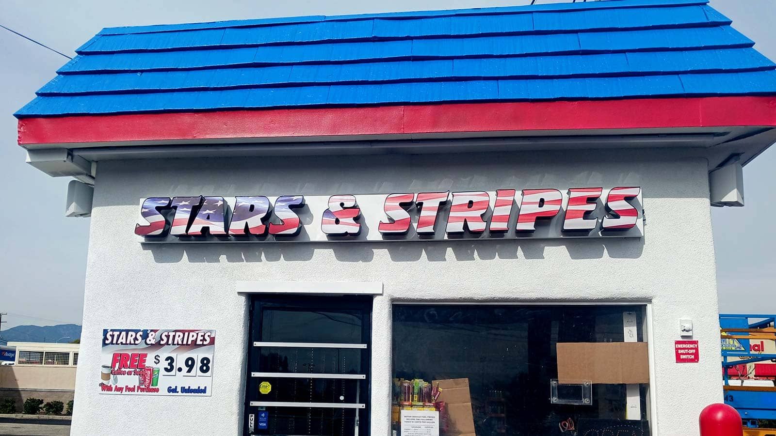 Stars and Stripes backlit letters attached to the storefront