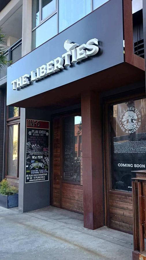 The Liberties outdoor sign attached at the entrance