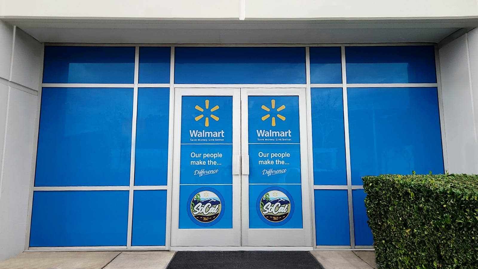 Walmart store signs applied to the glass