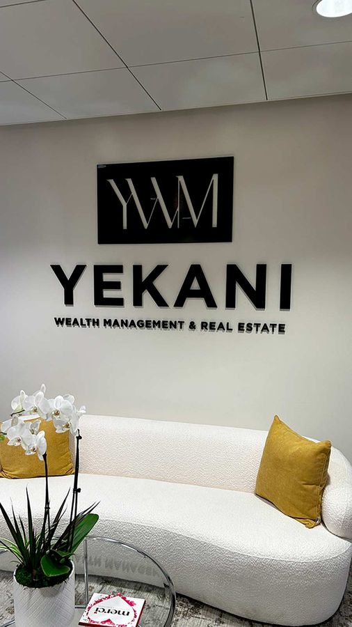 Yekani Wealth Management & Real Estate sign for branding