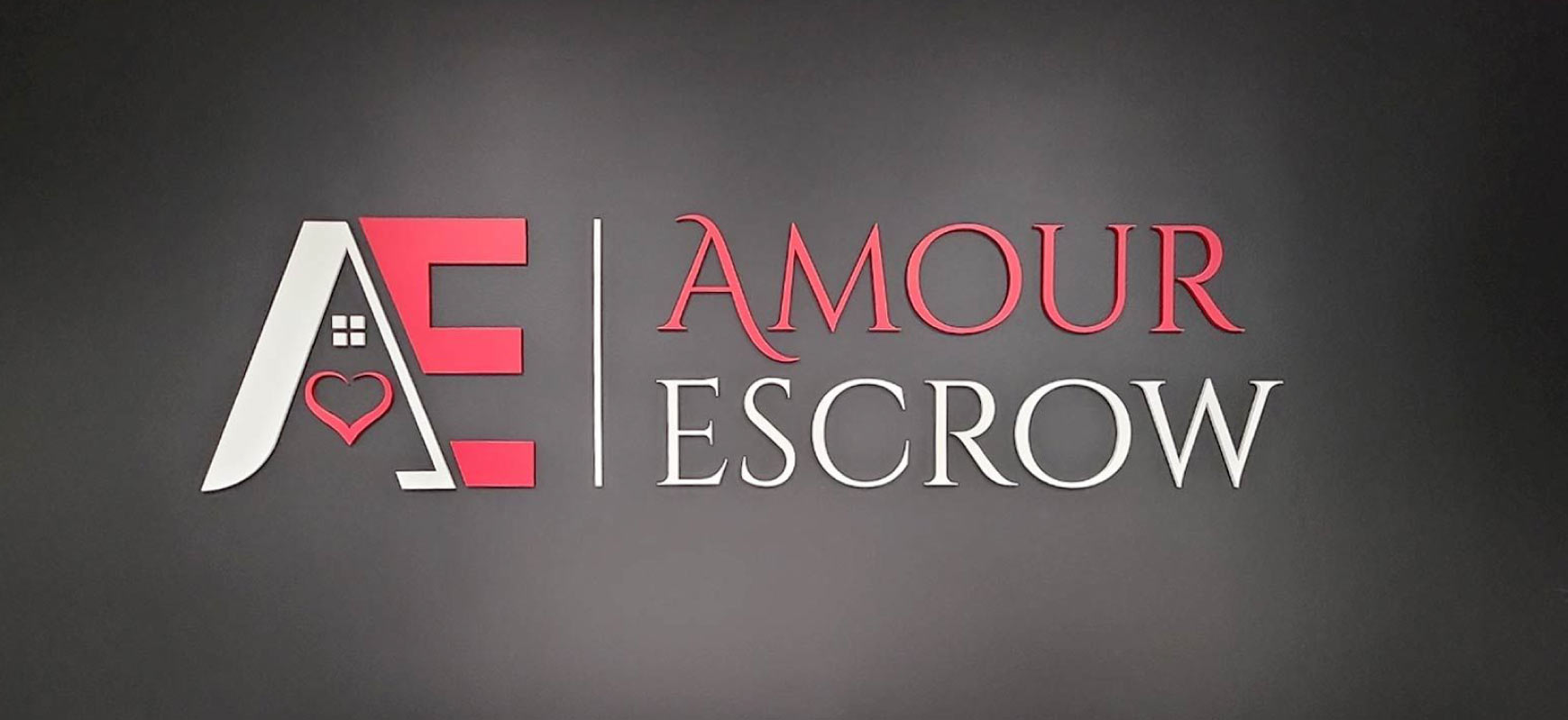 Amour Escrow trendy sign showing the brand name and logo made of acrylic for interior branding