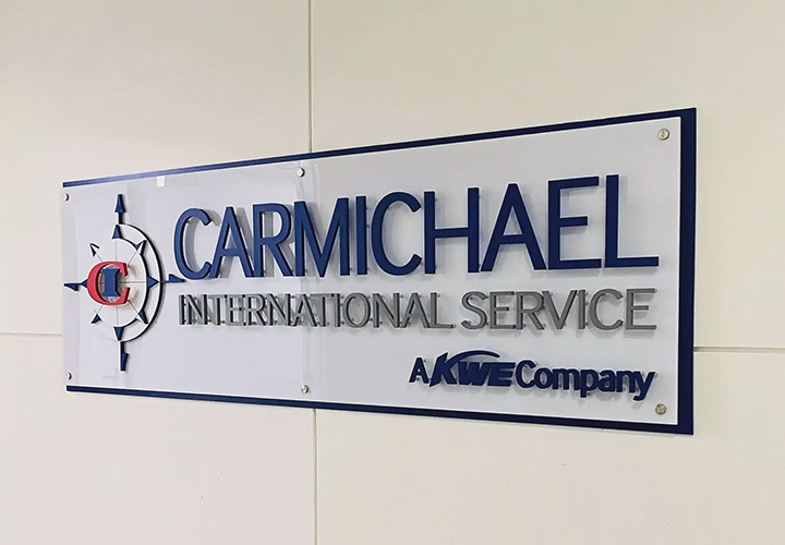 Carmichael International Service acrylic sign in a modern style for branding