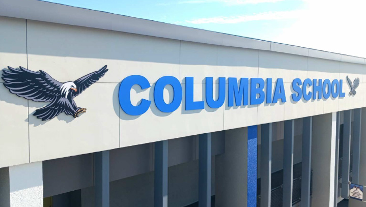 Columbia School modern signage in blue made of PVC for building facade branding