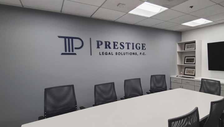 Prestige Legal Solutions modern signage displaying the company name and logo made of acrylic