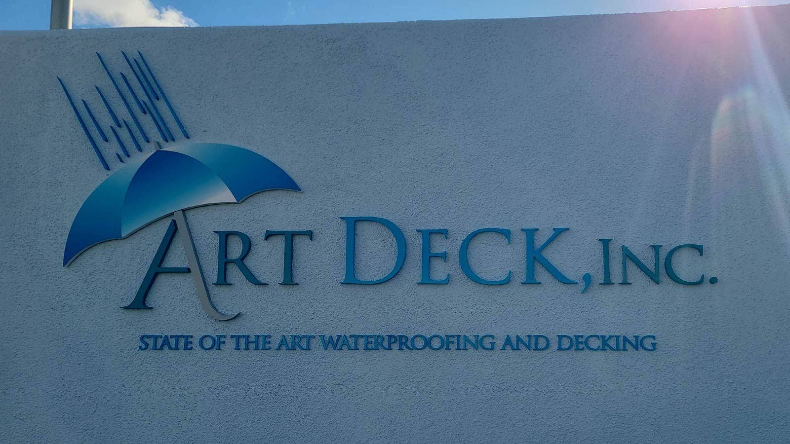 Art Deck, Inc. building sign installed on the facade