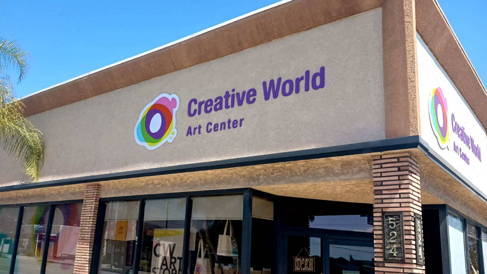 Creative World Art Center modern sign on the building