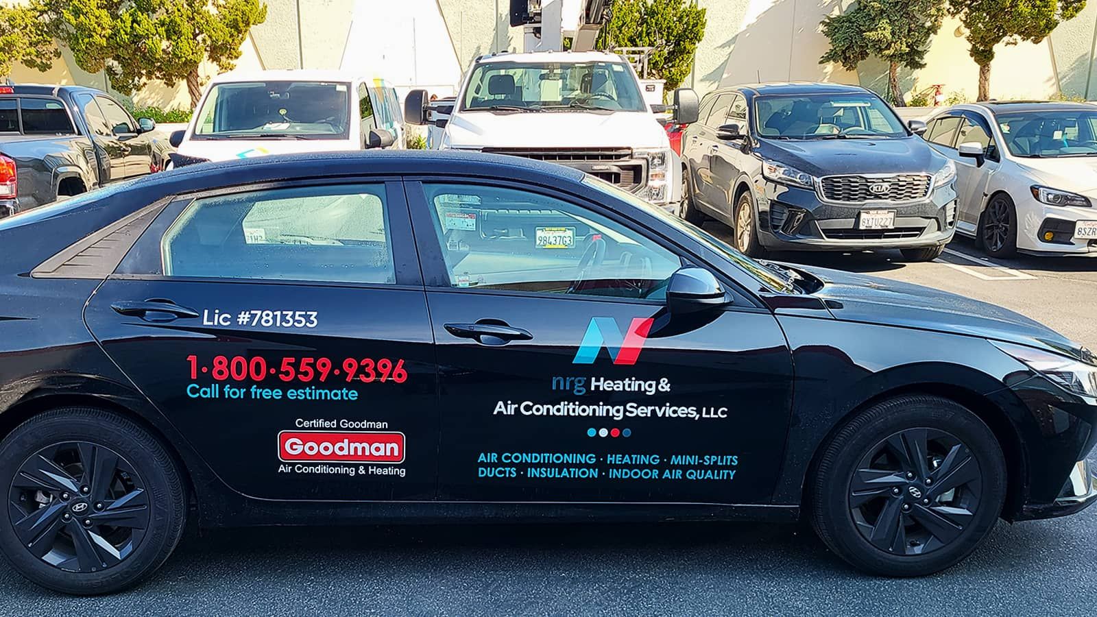 NRG Heating & Air Conditioning car wrap applied to the door