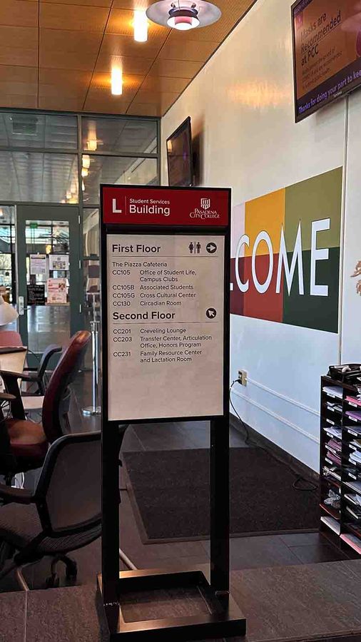 Pasadena City College lobby sign near the desk