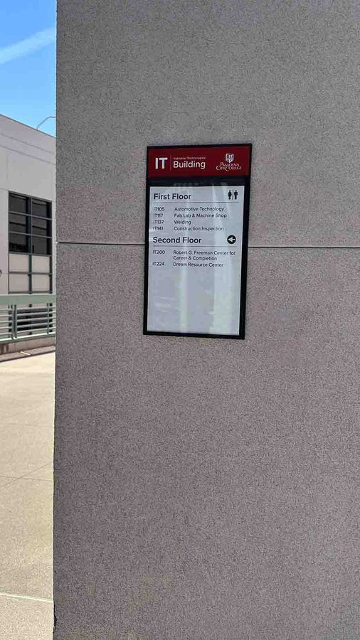 Pasadena City College wayfinding sign attached to the wall