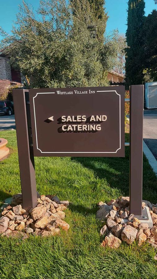 Westlake Village Inn monument sign installed by the road