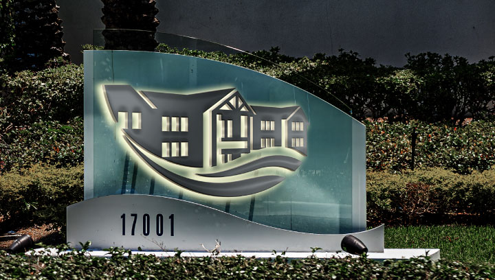 Decorative residential signage in a free-standing style with edge lighting design