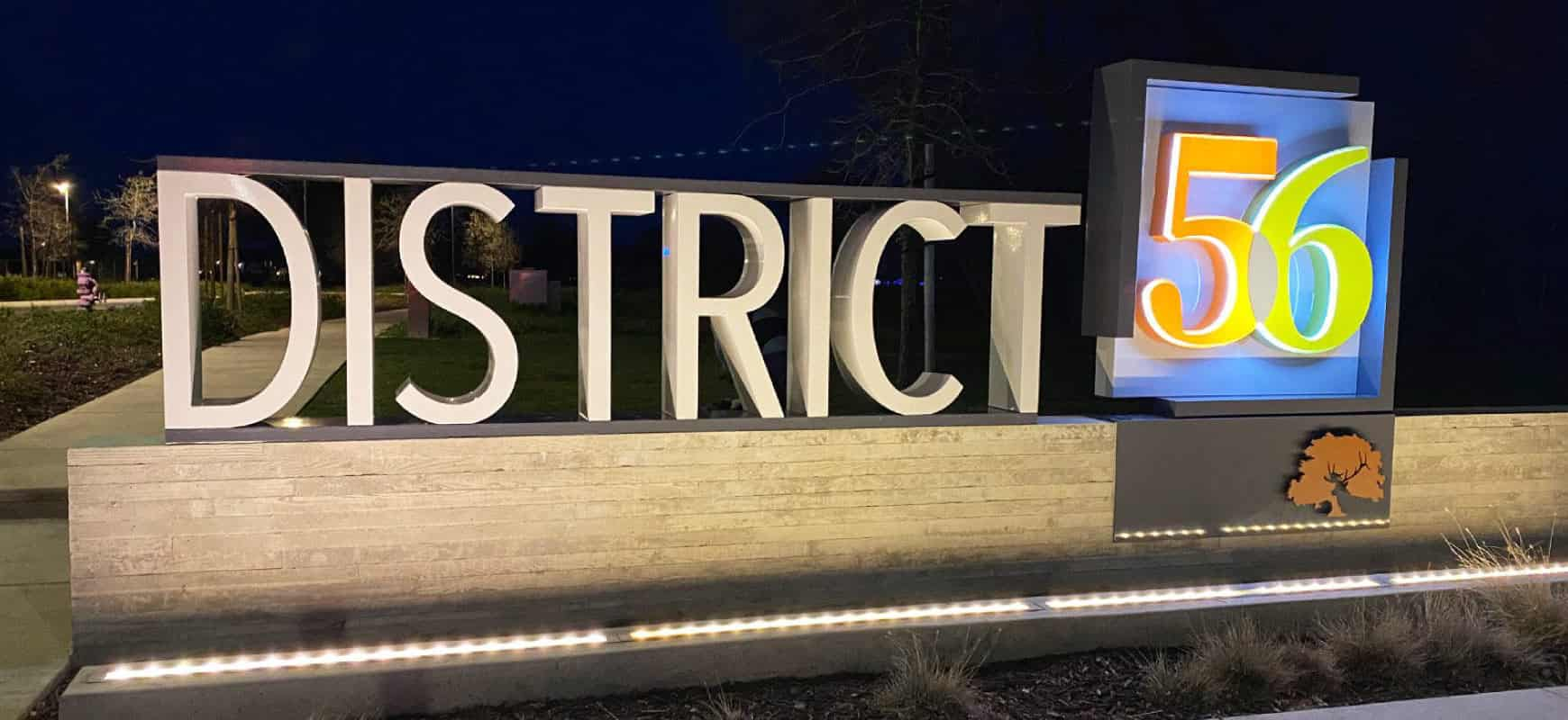 District56 neighborhood sign displaying the community name made of aluminum and lexan