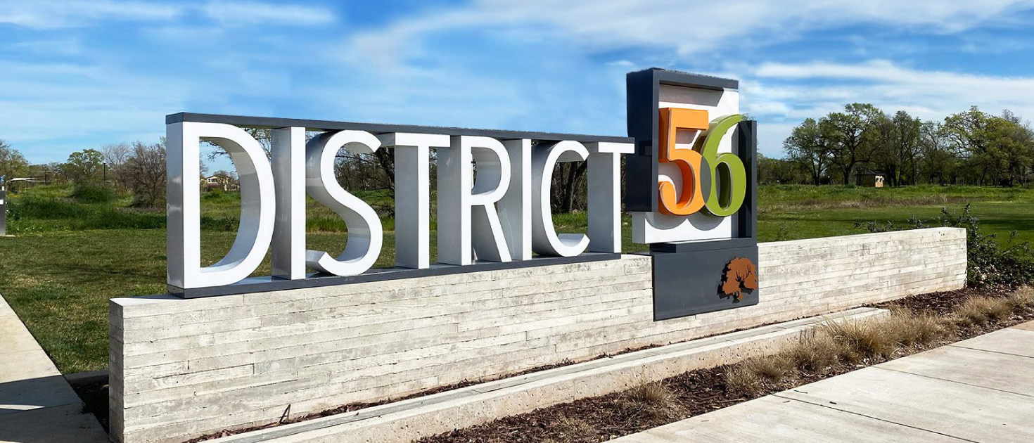 District56 neighborhood signage with colorful numbers made of aluminum and lexan for design